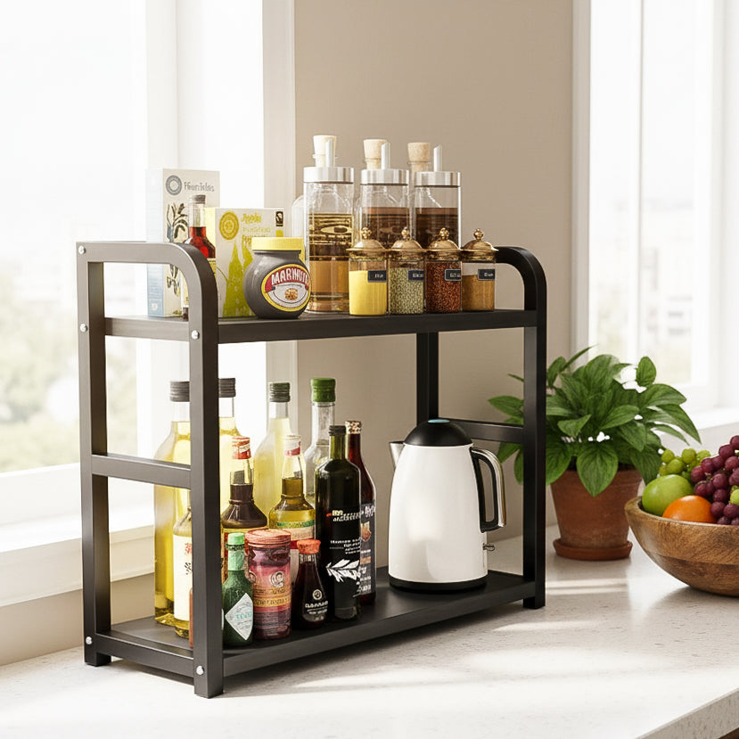 Kitchen rack with various items including bottles and a kettle on a countertop.
